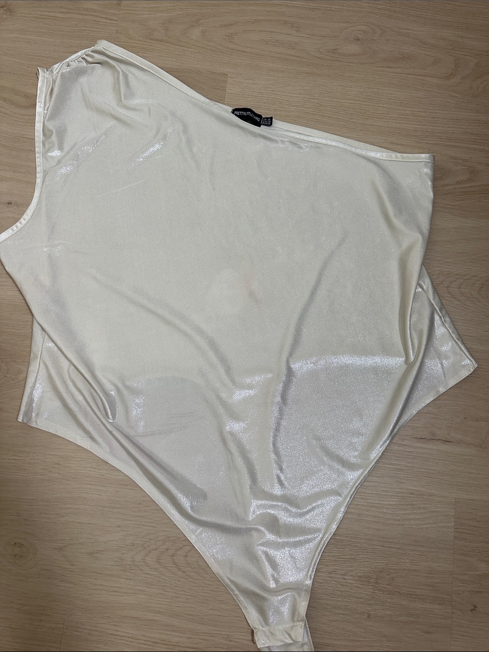 PrettyLittleThing Shimmery Ivory One-Shoulder Bodysuit